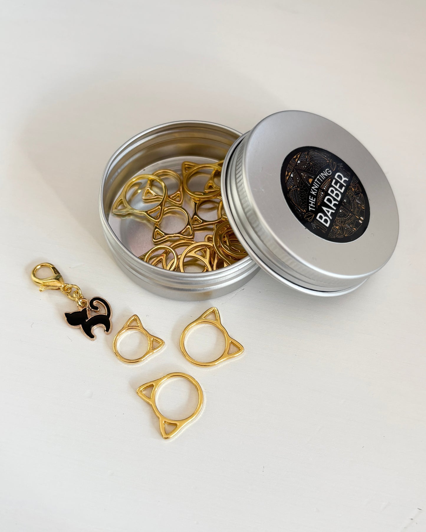 Kitty-Cat silmukkamerkit, TKB